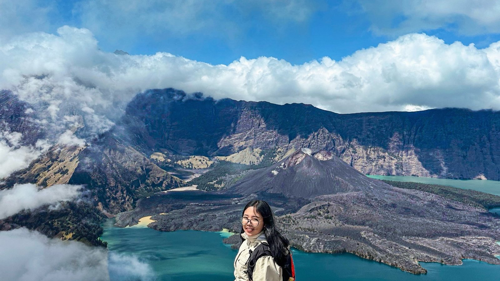 The turquoise water of Lake Segara Anak with Mount Baru Jari in the center